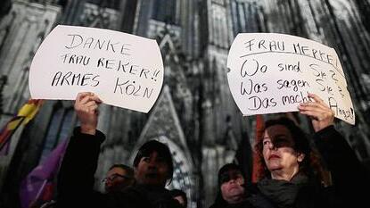 Protestanten gegen Gewalttaten in Köln