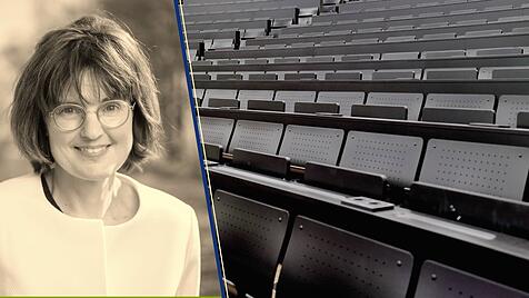 Redakteurin Regina Einig, leere Plätze im Hörsaal.