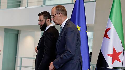 Friedrich Merz und Ahmed al-Sharaa