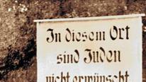 Schild "In diesem Ort sind Juden nicht erwünscht"