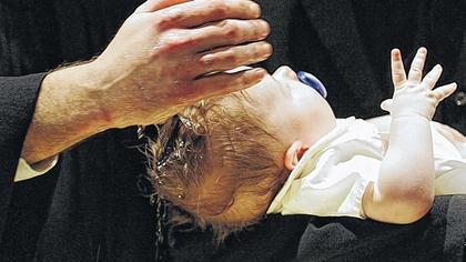 Kindstaufe in der Christmette