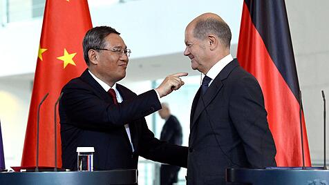 Li Qiang und Olaf Scholz