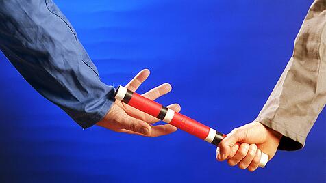 Stabübergabe beim Staffellauf