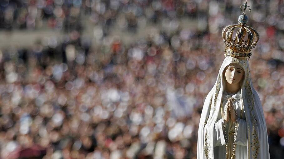 A statue of the Virgin Mary is seen during a procession at the holy shrine of our lady of Fatima in central Portugal