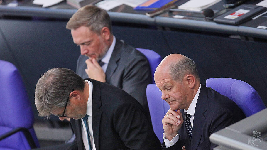 Christian Lindner, Robert Habeck und Olaf Scholz im Bundestag