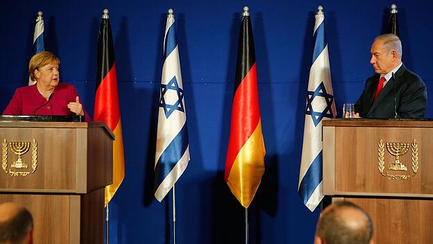 (181005) -- JERUSALEM, Oct. 5, 2018 -- German Chancellor Angela Merkel (L) and Israeli Prime Minister Benjamin Netanyah
