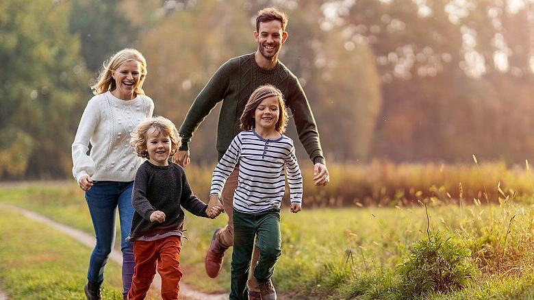 Young family having fun outdoors