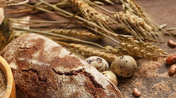 Fresh bread on the village table. Ingredients.