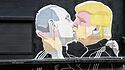 Graffiti of Trump kissing Putin
