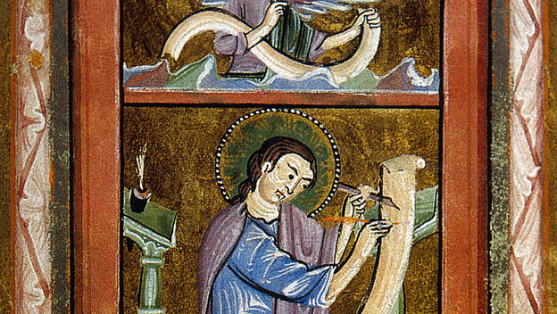 Saint Matthew the Apostle writing the Gospel.