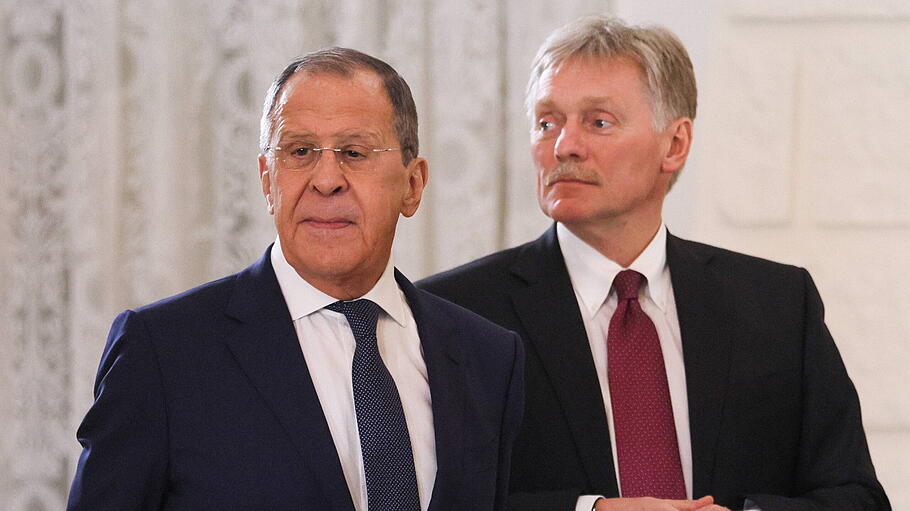 Sergei Lawrow und  Dmitri Peskow