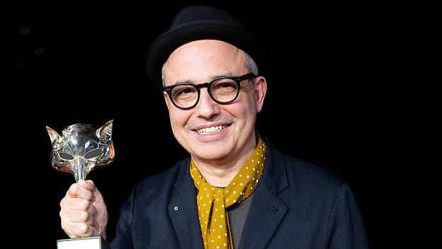 , Photocall Director Pablo Berger winner of the Best Comedy Film Award for Robot Dreams , poses in the press room during