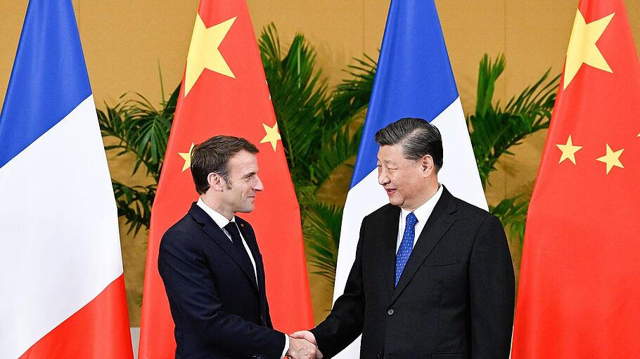 Frankreichs Präsident Macron mit Chinas Präsident Xi