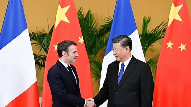 Frankreichs Präsident Macron mit Chinas Präsident Xi