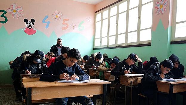 January 19, 2021: Kafr Dariyan, Idlib. 19 January 2020. Teaching and exams take place at a school in the northern Syrian