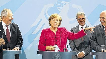 Angela Merkel mit Matthias Kleiner, Klaus Töpfer und Norbert Röttgen