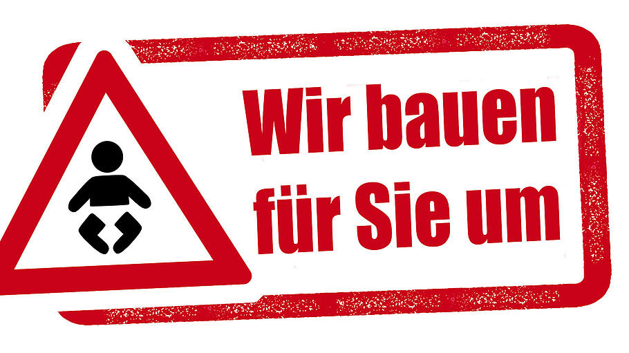 Schild - Wir bauen für Sie um