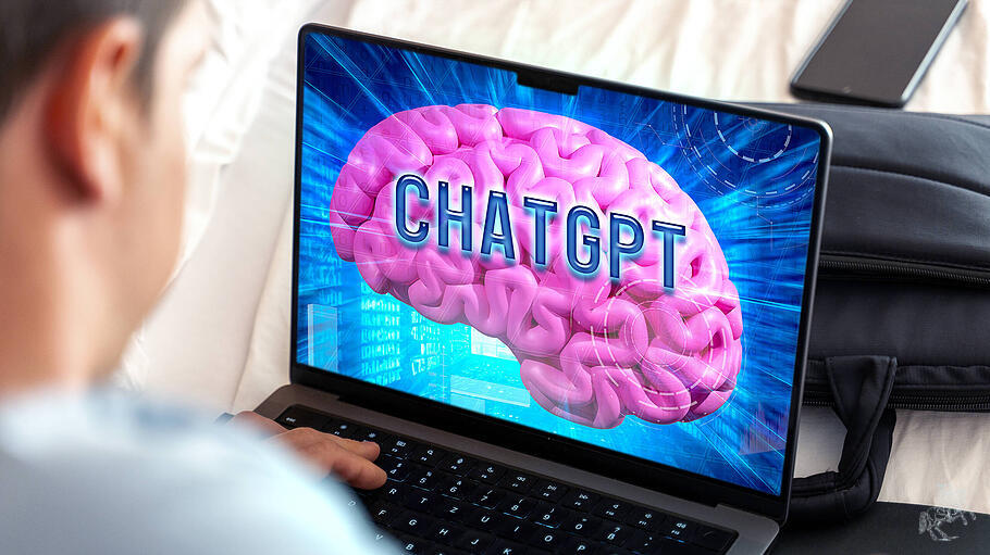 27 September 2023: Artificial intelligence and chatbot ChatGPT website on a brain in a laptop computer. Man in front of