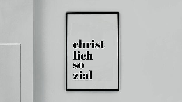 Bilderrahmen mit Schriftzug christlich sozial