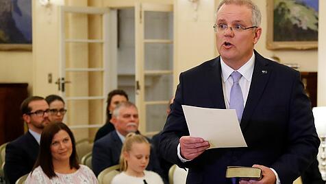 The new Australian Prime Minister Scott Morrison attends a swearing-in ceremony in Canberra