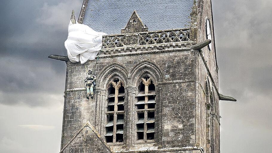 D-DAY. Paratrooper hanging from church, St. Mere Eglise, Normandy, France