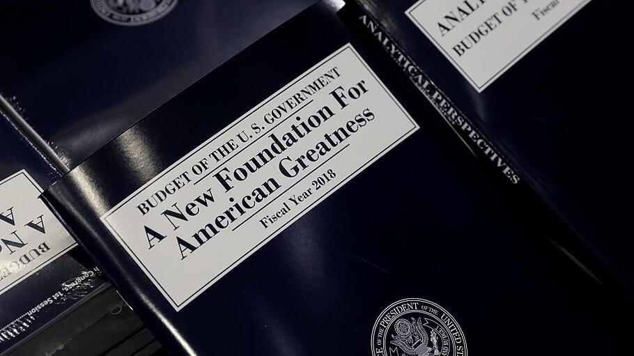 Copies of the budget are distributed on Capitol Hill in Washington