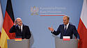 Olaf Scholz, Donald TuskMinister Donald Tusk (R) a