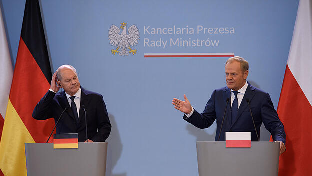 Olaf Scholz, Donald TuskMinister Donald Tusk (R) a
