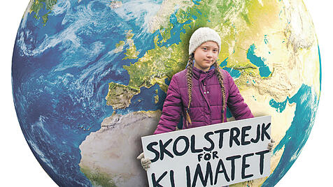 Greta Thunberg mit Weltkugel