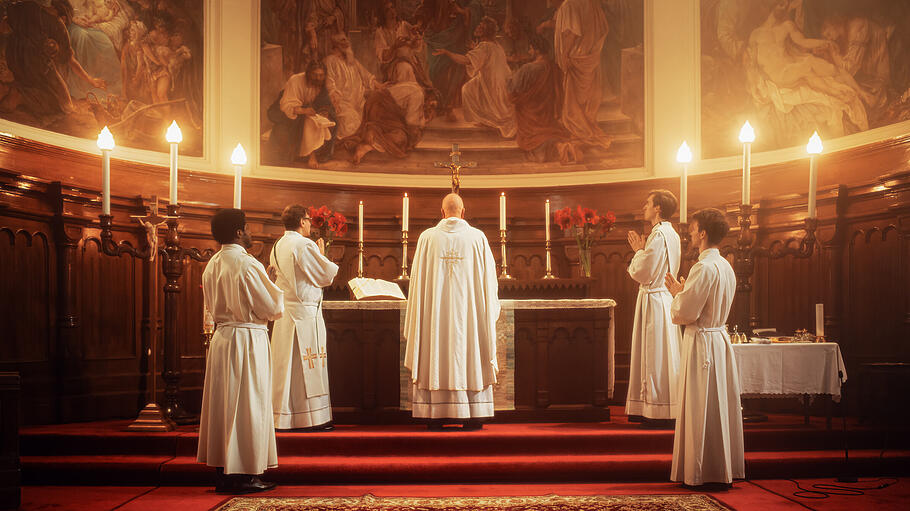 In Grand Old Church at the Altar Ministers Lead The Eucharist, a
