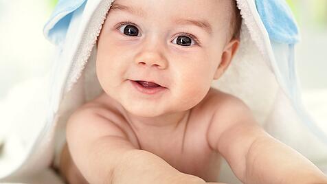 Smiling baby after shower