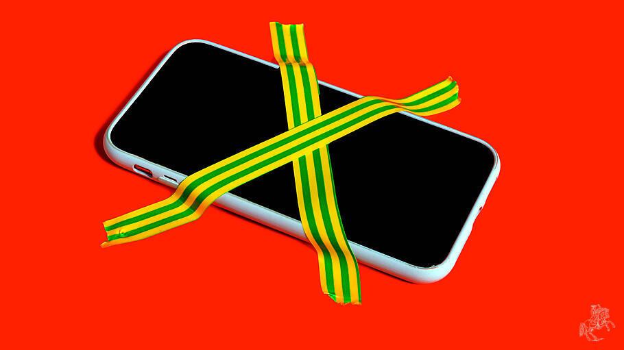 Colorful still life of a banned smartphone with cross-hatched adhesive tape symbolizing digital detox and mindfulness