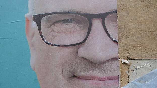 beschädigtes CDU-Wahlplakat in Berlin
