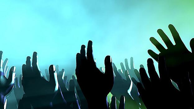 Audience Hands And Lights At Concert