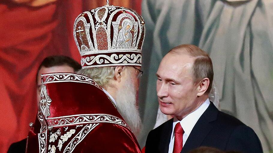 Wladimir Putin und Patriarch Kyrill I. beim Ostergottesdienst