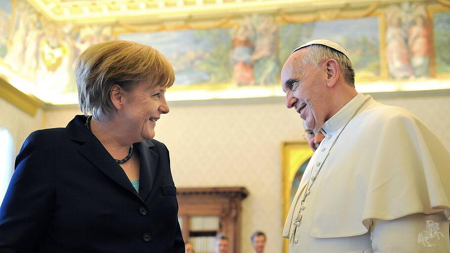 Franziskus und Merkel