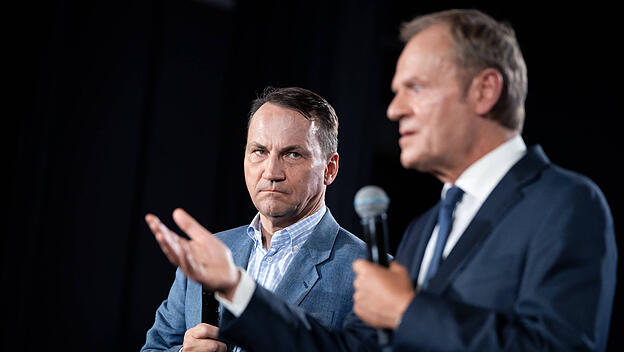 Polens Außenminister Radoslaw Sikorski und Regierungschef Donald Tusk
