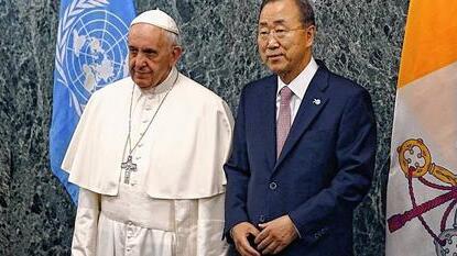 Pope Francis poses with United Nations Secretary General Ban Ki-moon at the United Nations in New York